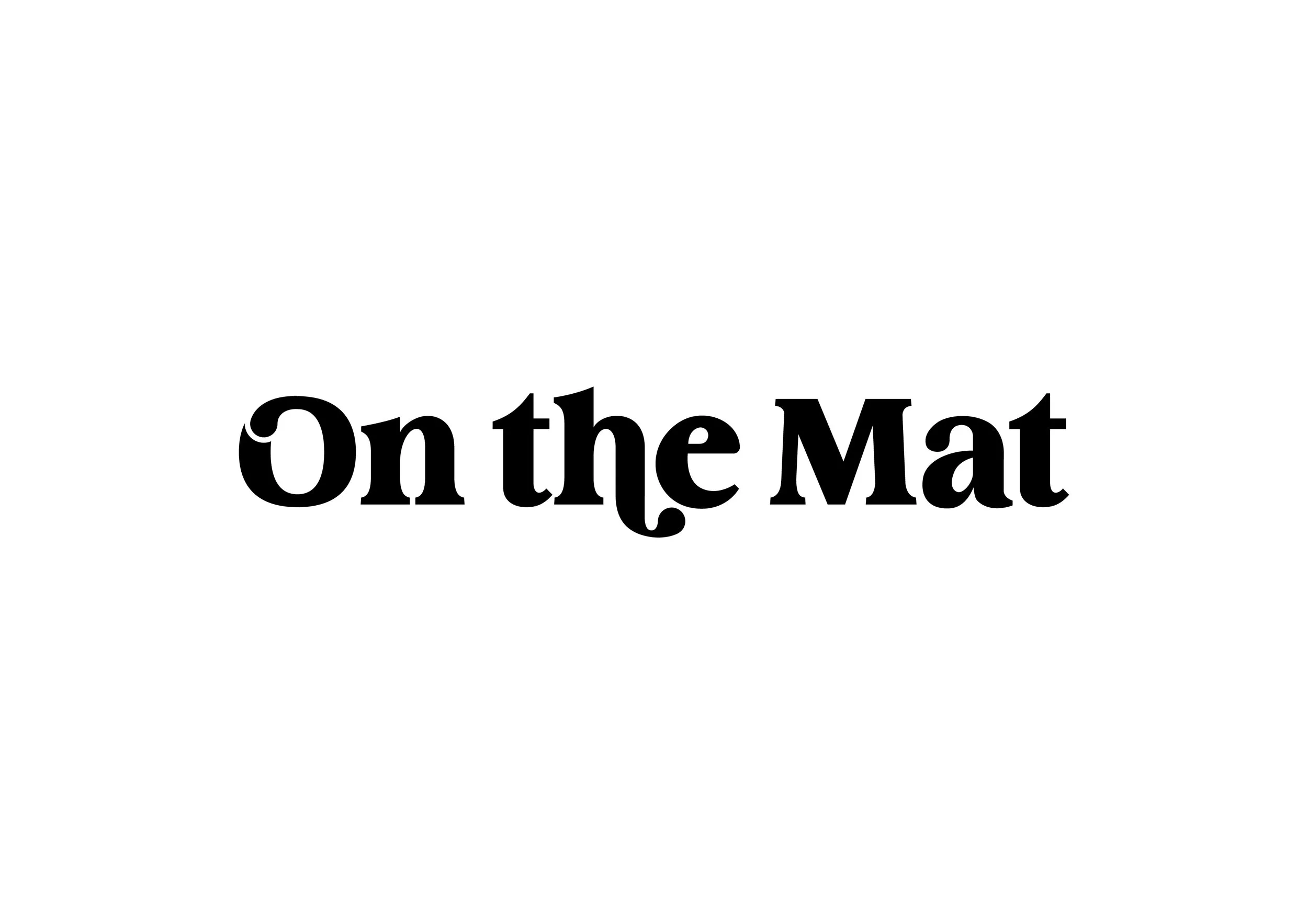 Text on white background reading 'On the Mat' in black stylized font.